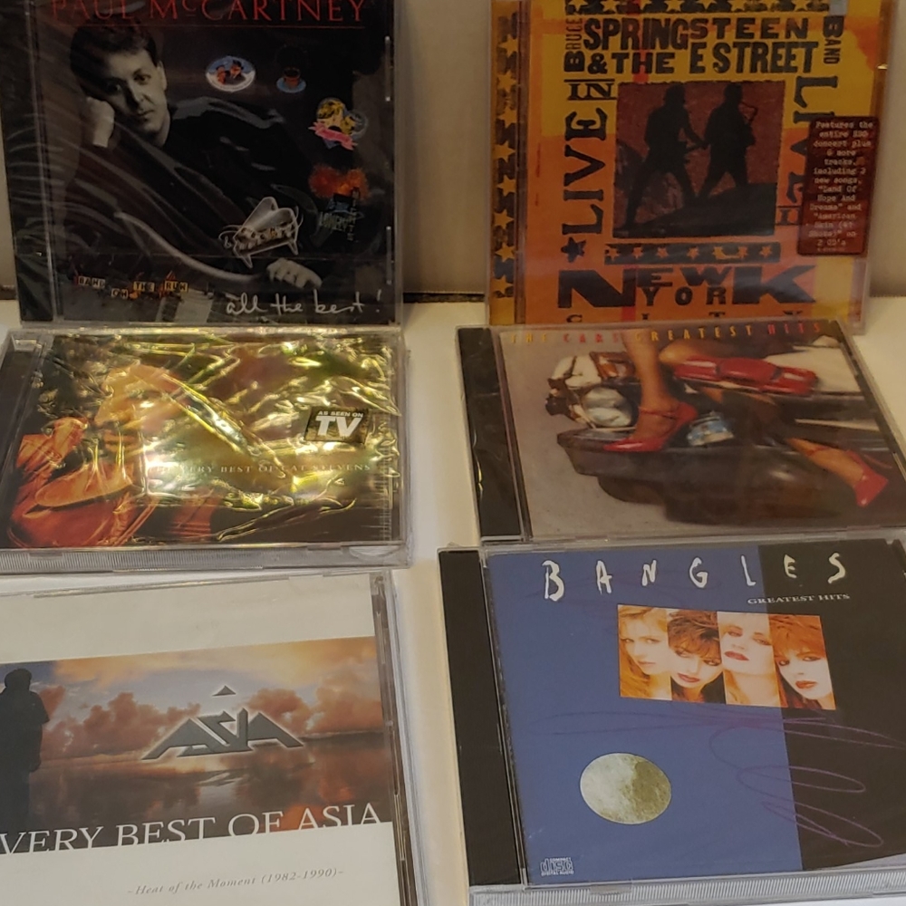 CD'S  .Paul McCartney Springsteen.   Bangles. and much more 2  for $18